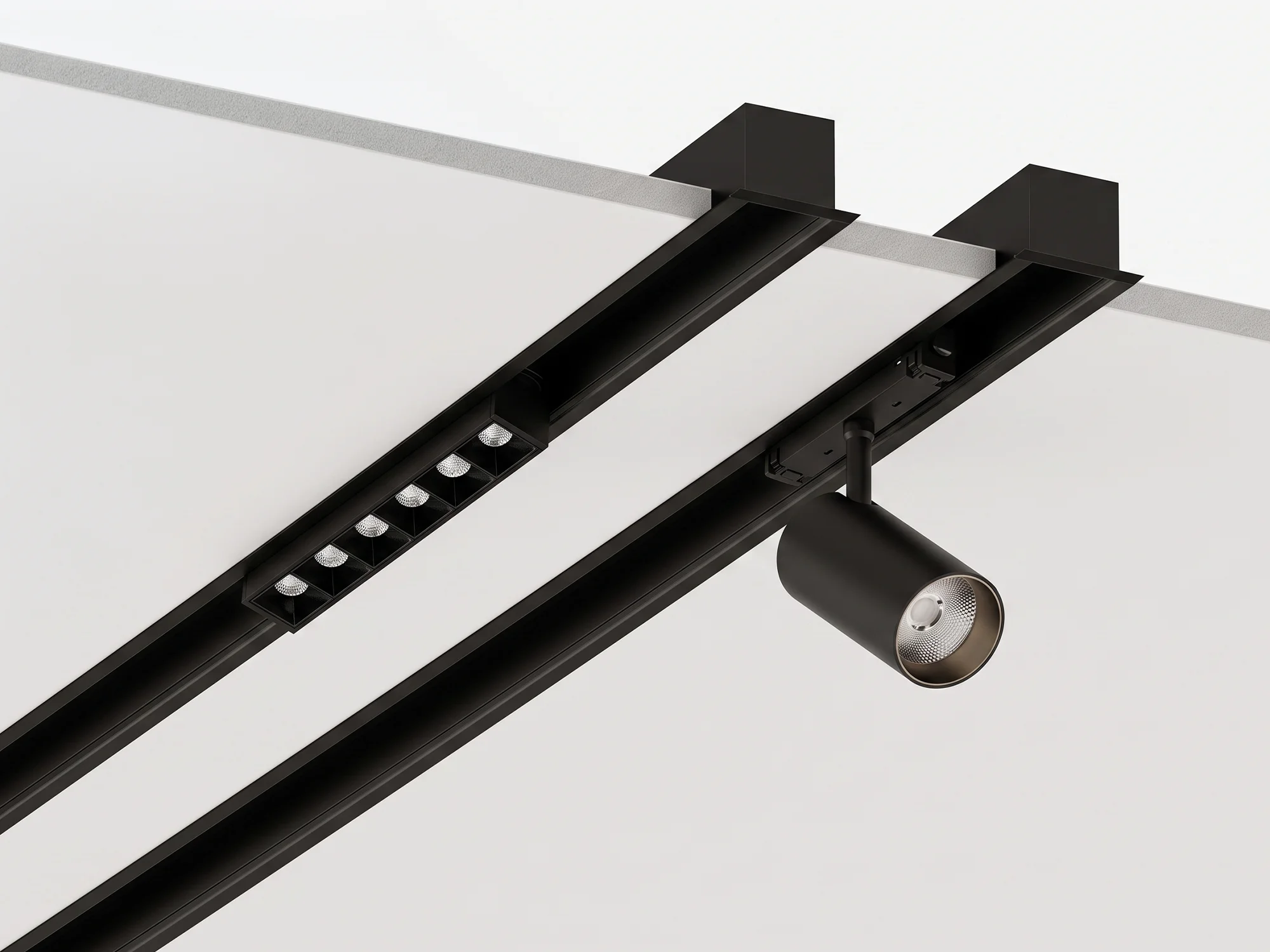 Tavana gömülü iki siyah magnet ray profili; birinde lineer LED modül, diğerinde silindirik spot modül